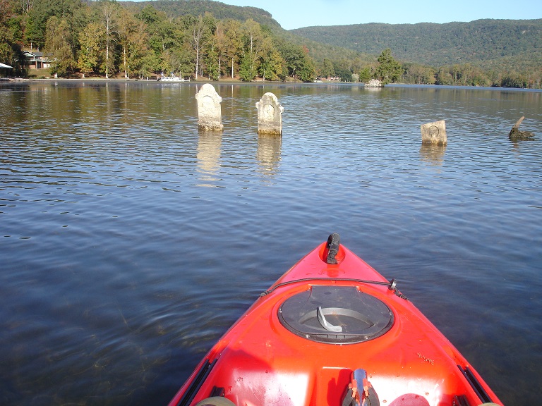 Flooded cemetery underwater graves.